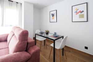 Posezení v ubytování Apartamentos Congreso, Parking gratuito