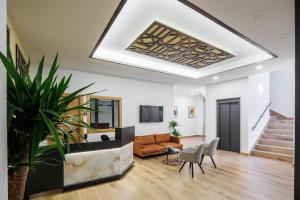 Posezení v ubytování Apartamentos Congreso, Parking gratuito