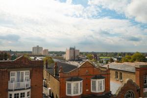 a view of the city from the roof of a building at Stylish Herne Bay apartment by the sea in Kent