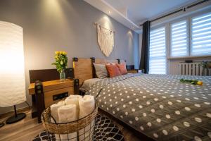 Posteľ alebo postele v izbe v ubytovaní Art Apartament 2 Ustrzyki Dolne