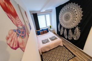 Posteľ alebo postele v izbe v ubytovaní Art Apartament 2 Ustrzyki Dolne