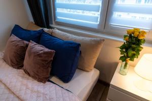 Posteľ alebo postele v izbe v ubytovaní Art Apartament 2 Ustrzyki Dolne