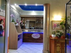 The lobby or reception area at Hotel Orchidea