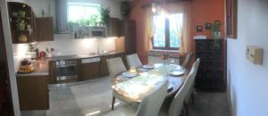 Kuchyň nebo kuchyňský kout v ubytování Holiday home Sandra