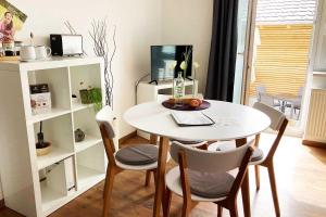 TV a/nebo společenská místnost v ubytování TS Apartments