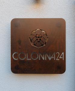 a sign that says colombiana on a wall at Colonna 24 Luxury Room in Portovenere near 5 Terre in Portovenere