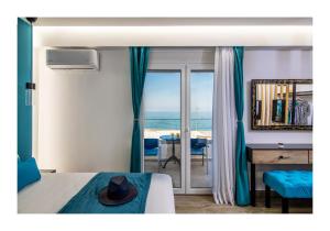 Postel nebo postele na pokoji v ubytování Platinum Suites