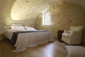 Postel nebo postele na pokoji v ubytování Corte San Pietro