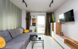 TV a/nebo společenská místnost v ubytování LoveRoom Panorama Park Jacuzzi