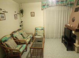 Posezení v ubytování Benicarlo 4A2 Apartamento con amplia terraza y vistas al mar, WIFI, garaje