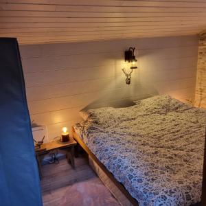 Letto o letti in una camera di Le Passage