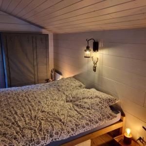 Letto o letti in una camera di Le Passage