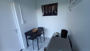 Posezení v ubytování Adorable studio avec entrée indépendante + 7 fotografií