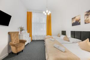 TV a/nebo společenská místnost v ubytování Downtown Bratislava B&B