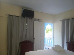 Postelja oz. postelje v sobi nastanitve Tamboo Resort
