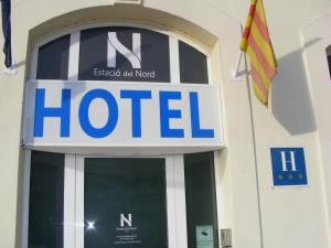 a hotel sign on the side of a building at Estació Del Nord in Vic