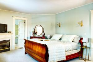 Ένα ή περισσότερα κρεβάτια σε δωμάτιο στο Gateways Inn