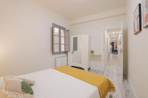 Posteľ alebo postele v izbe v ubytovaní ROOMMY