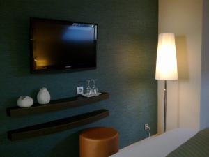 TV a/nebo společenská místnost v ubytování B&B de Taller-Hoeve