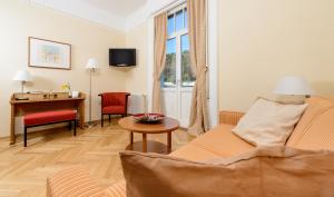 TV a/nebo společenská místnost v ubytování Hotel Herzoghof