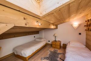 Posteľ alebo postele v izbe v ubytovaní Appartement Bridan - Welkeys
