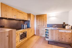 Kuchyňa alebo kuchynka v ubytovaní Appartement Bridan - Welkeys