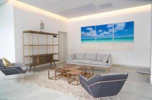 Fotografia z galérie ubytovania Stylish luxury condo, central location, ocean view, pool, gym v destinácii Oranjestad