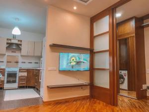 Kuchyň nebo kuchyňský kout v ubytování City Center 1 Bedroom + Living