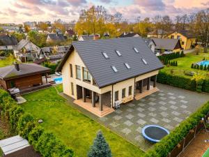 an aerial view of a house with a yard at Amber Villa in Riga
