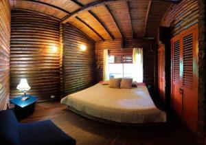 Postel nebo postele na pokoji v ubytování Eco Cabañas San Lorenzo