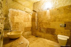 a bathroom with a sink and a toilet at Atilla's Cave Hotel in Nevsehir