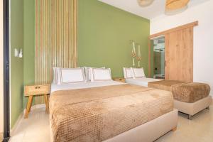 Postel nebo postele na pokoji v ubytování La Casona Hotel Boutique