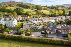 an aerial view of a small town with houses at The Cedars in Builth Wells
