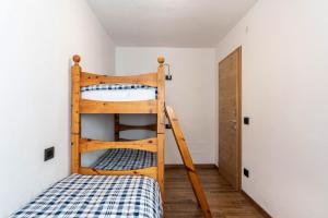 Posteľ alebo postele v izbe v ubytovaní Condominio Lucia 7