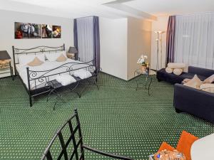 Postel nebo postele na pokoji v ubytování Hotel Rhyhof