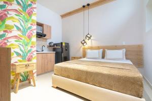 Postel nebo postele na pokoji v ubytování La Casona Hotel Boutique