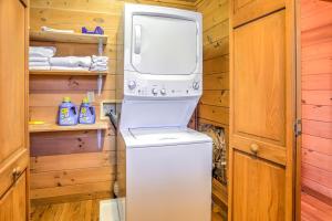 a washer and dryer in a tiny house at Bear Naked Bungalow in Blue Ridge +41 photos