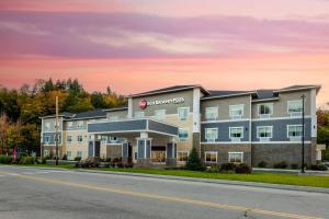 a rendering of the front of a hotel at Best Western Plus Rumford Falls in Rumford
