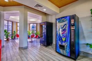 a room with a colorful vending machine in a building at Motel 6 Birmingham, AL - Medical Center - Inverness Hwy 280 in Birmingham +27 photos