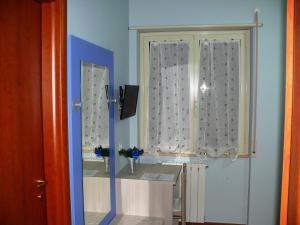 TV a/nebo společenská místnost v ubytování B&B Max + 37 fotografií