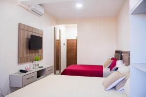 Lova arba lovos apgyvendinimo įstaigoje Liebling Hotel Ciudad del Este