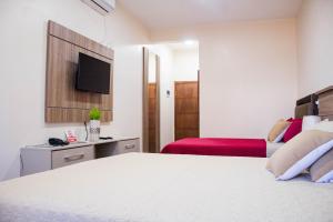Lova arba lovos apgyvendinimo įstaigoje Liebling Hotel Ciudad del Este