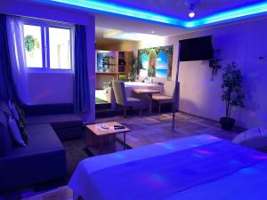 TV a/nebo společenská místnost v ubytování Sosua Inn Hotel