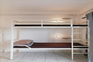 a white bunk bed in a room at 8 SLEEPER STREET Hostel in Krabi