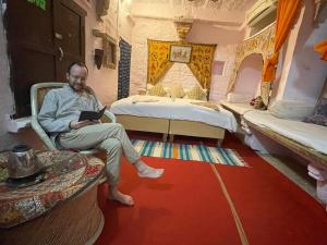 Voodi või voodid majutusasutuse Shiva Guest House toas