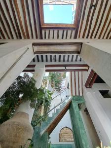 a view from the top of a building with a ceiling at Makubwa House in Lamu