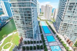 an aerial view of a city with tall buildings at Beautiful One Bedroom Condo 16ft ceilings at the W in Miami
