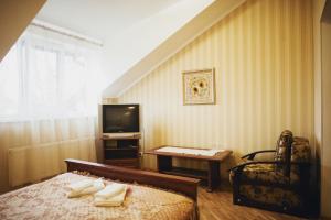 Posteľ alebo postele v izbe v ubytovaní Complex Zolota Pidkova + 37 fotografií