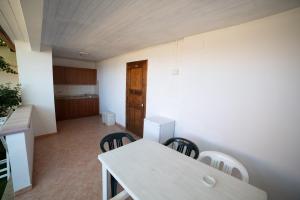 Kuchyň nebo kuchyňský kout v ubytování Residence New Paradise