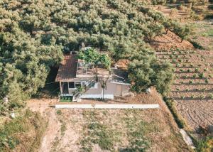 an aerial view of a house in a field at The Mills House in Kallithea +26 photos